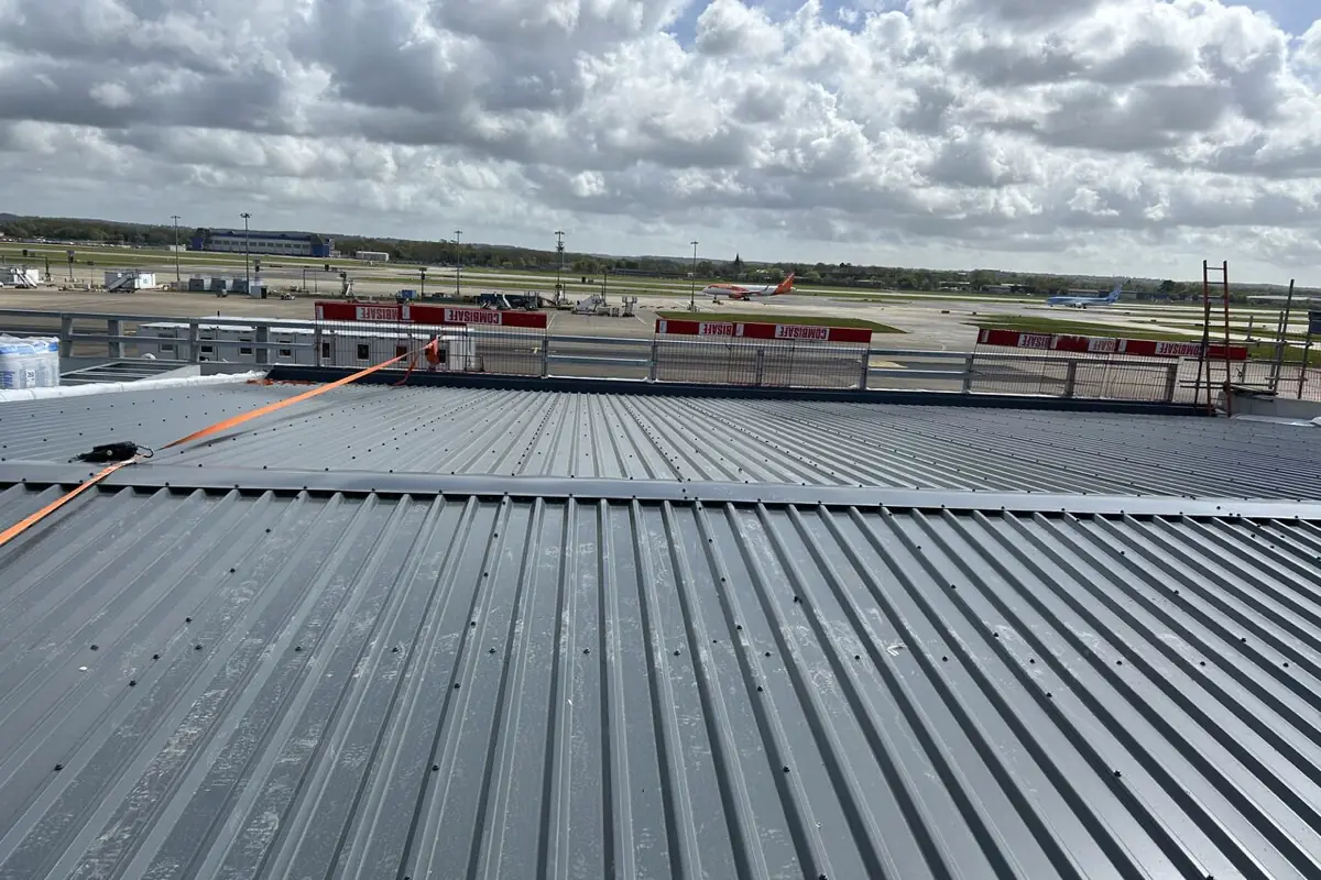 Newly installed profiled metal roof sheeting on an airport building