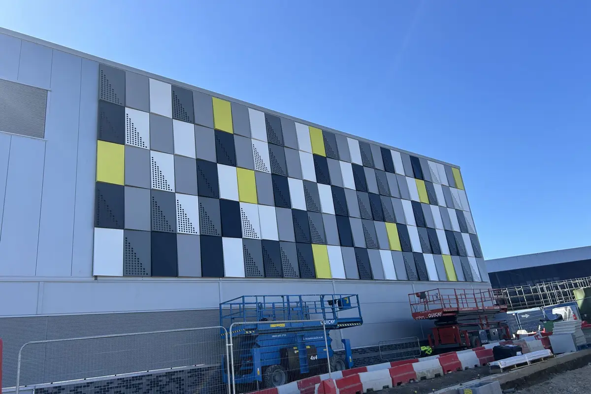 Multi-coloured rainscreen cassette panel facade