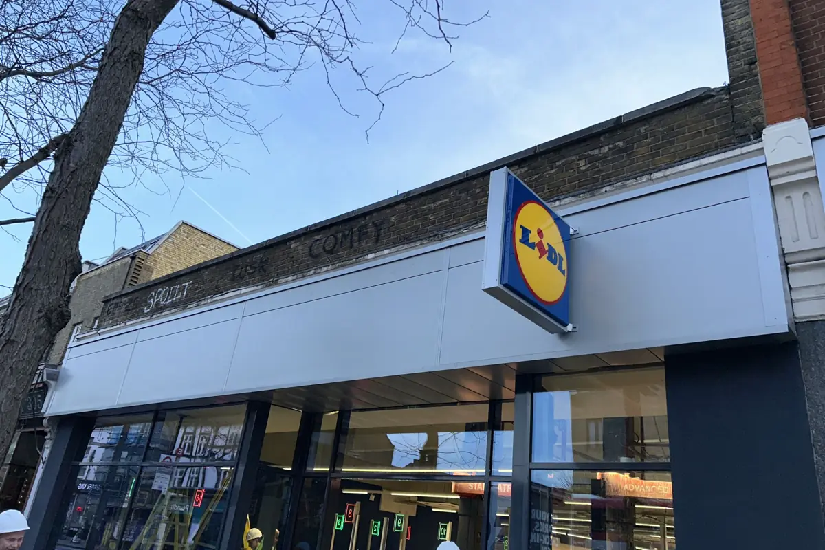 The new aluminium fascia and signage panel on the London shopfront