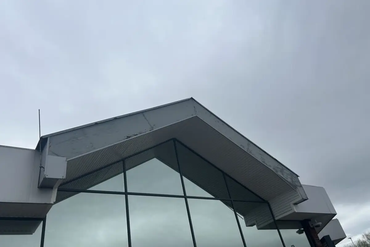 New grey fascia and canopy metalwork on the dealership gable